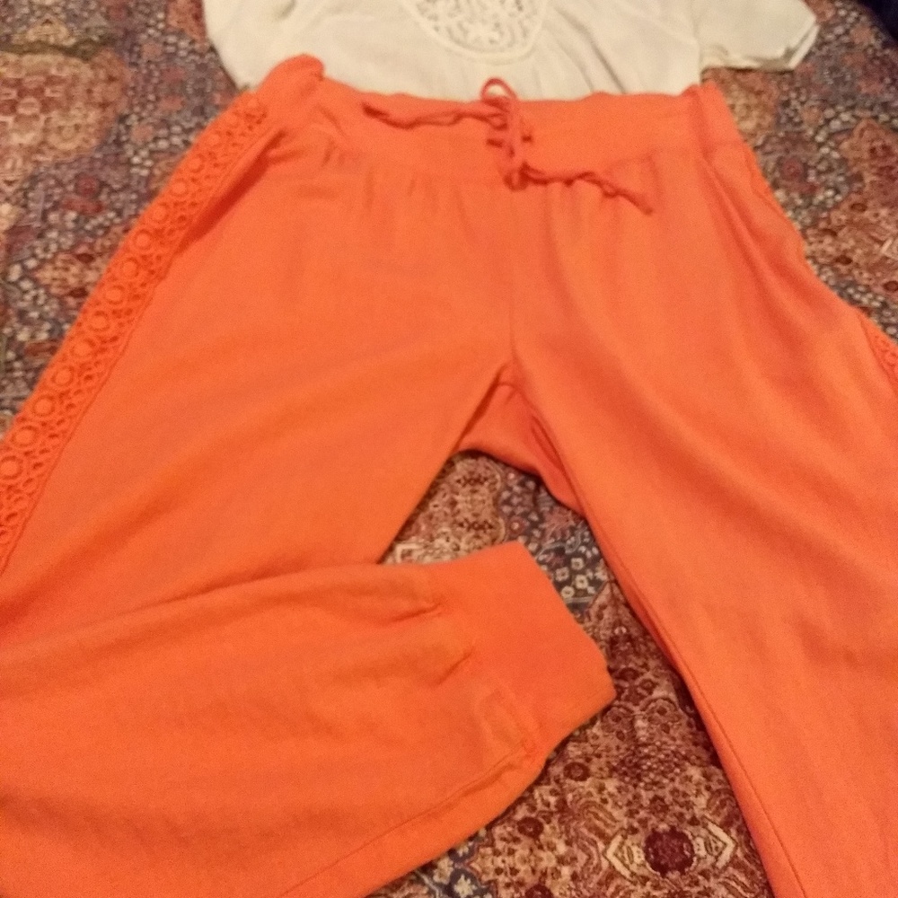 Coral color jogger with embroidery detail